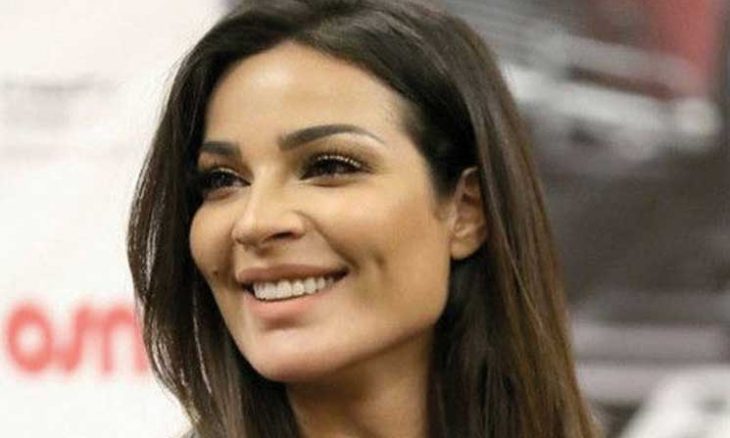 Nadine Nbadib Njeim with a look: 