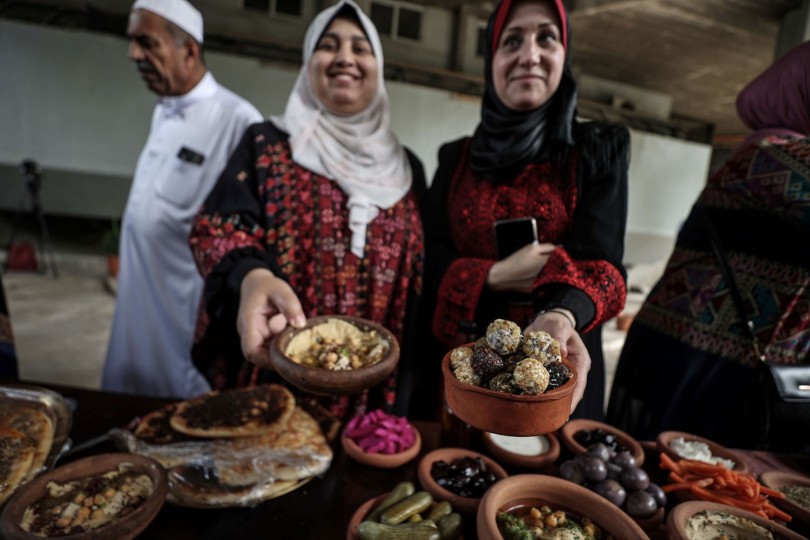 فلسطينيون في غزة يحيون يوم التراث الوطني بالمأكولات الشعبية 33333333